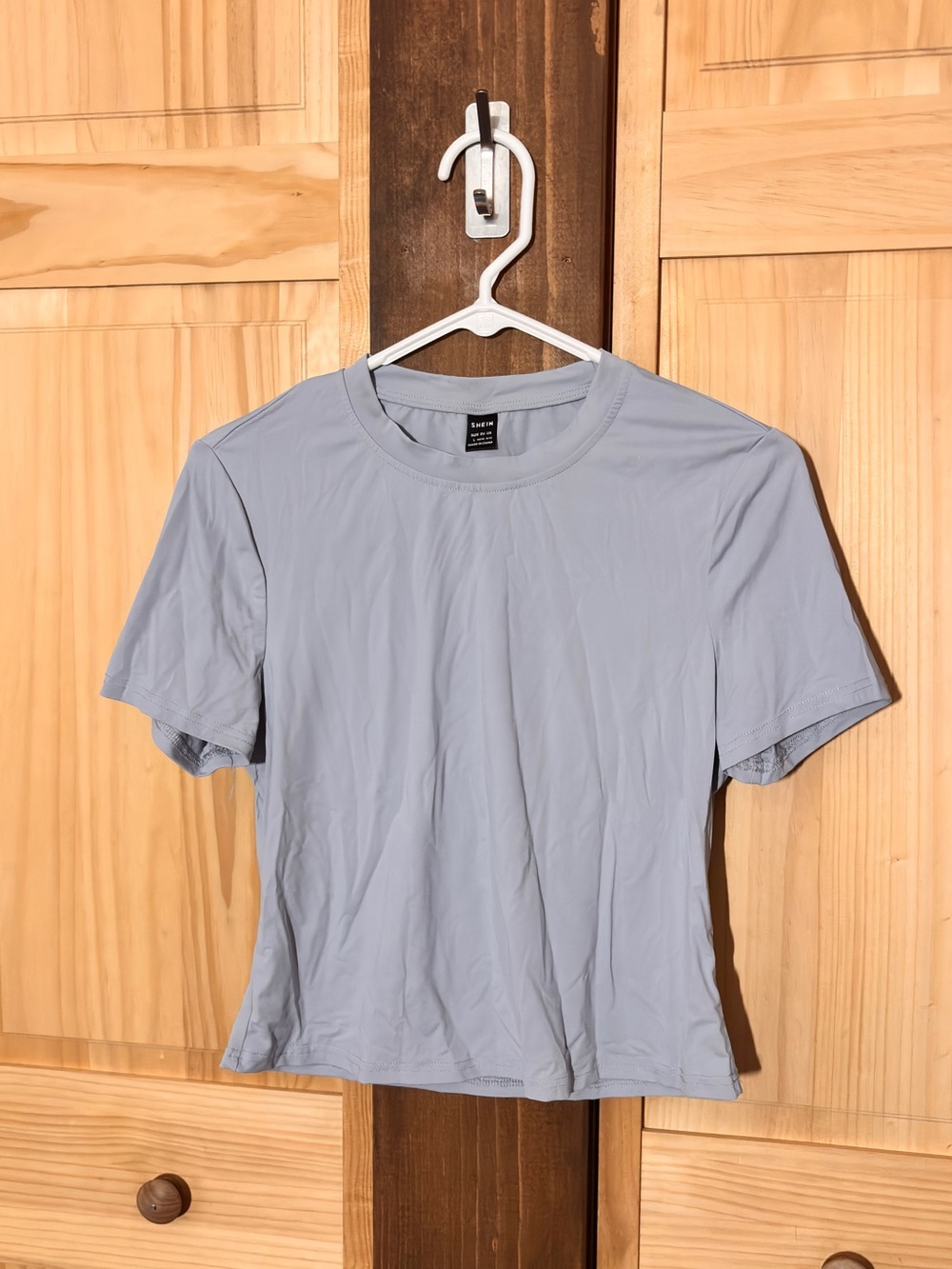 NWOT Sleek Material Crew Neck Short Sleeve Crop Tee